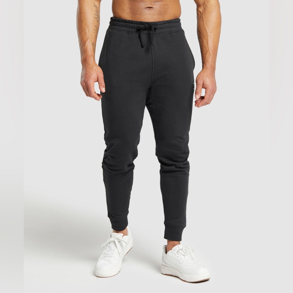 Gymshark CREST JOGGERS
Slim Fit